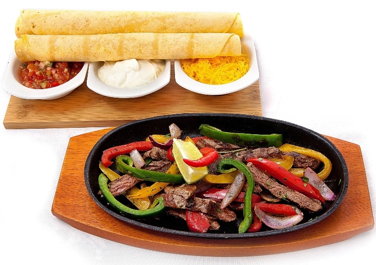 Beef fajitas, served